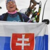 Anastasia Kuzminová sa teší v cieli po zisku zlatej olympijskej medaily počas pretekov žien s hromadným štartom na 12,5 km. FOTO TASR - Michal Svítok